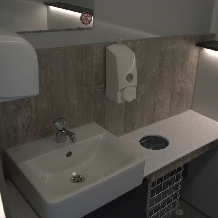 Waschbecken in einem mietbaren Toilettenwagen